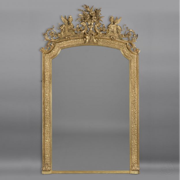 A Large Louis XVI Style Carved Giltwood and Gesso Mirror