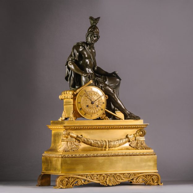 Pendule à manteau en bronze patiné et doré Charles X