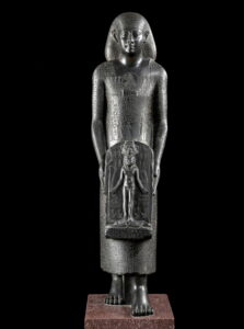 Emile Picault was inspired to sculpt his Priest and Scribe figures with reference to Ancient Egyptian antiquities such as the ‘Priest of Bastet’ statue (Musée du Louvre, E 10777). 