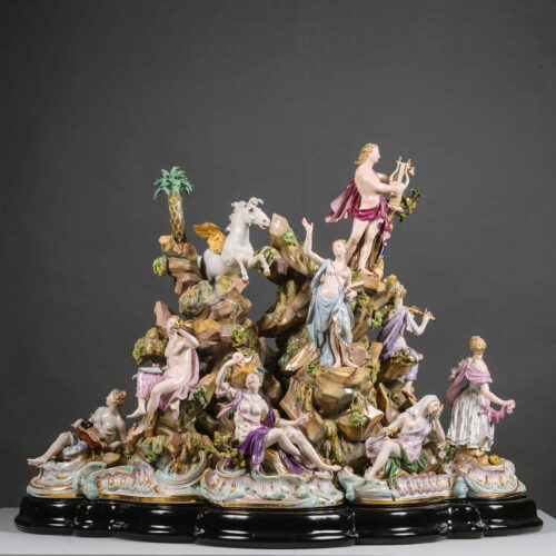 A Monumental Meissen Porcelain Figural Group of Apollo and the Nine Muses on Mount Parnassus.